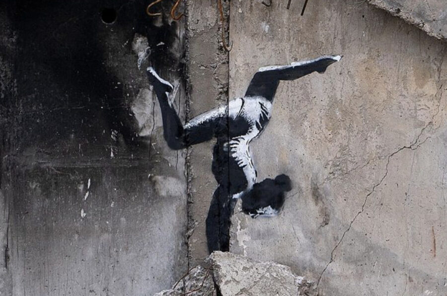 Banksy’s graffiti on the wall of the ruined house in Borodyanka